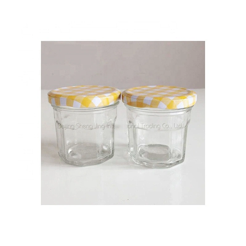 Hot sale clear glass empty hexagonal honey jar