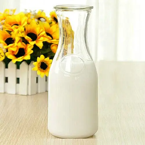 Venta al por mayor de botellas de leche de cristal pequeñas decorativas exquisitas vendedoras calientes