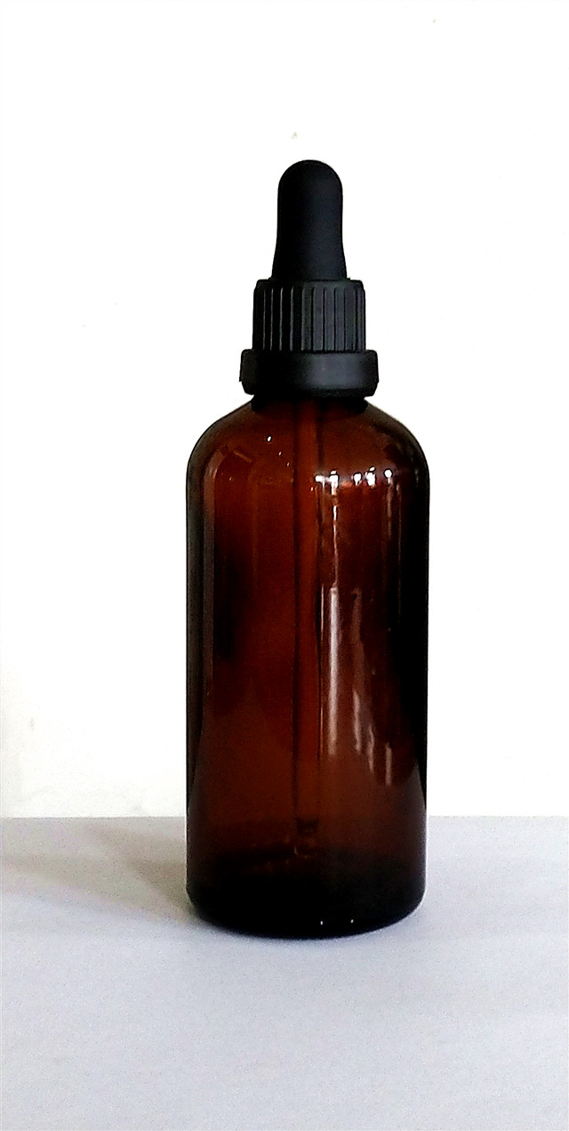 amber frosted essential oil bottle