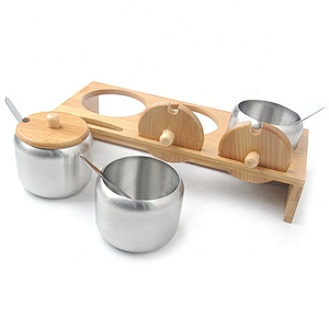 Hot selling bamboo spice rack with stainless steel jars for kitchen