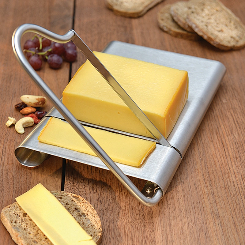 Stainless steel cheese slicer with a spare blade