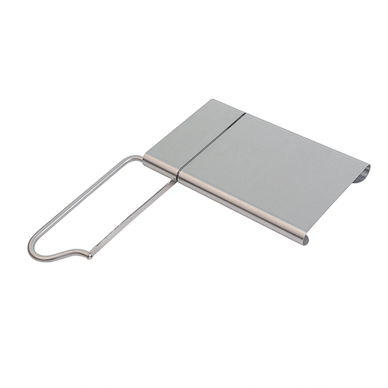 Stainless steel cheese slicer with a spare blade