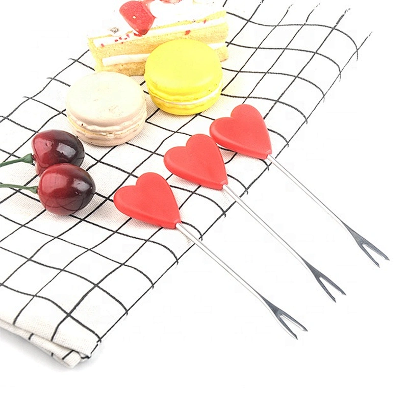 Heart-shaped stainless steel and plastic fruit fork
