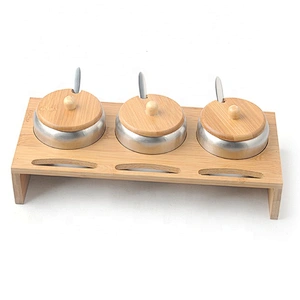 Hot selling bamboo spice rack with stainless steel jars for kitchen