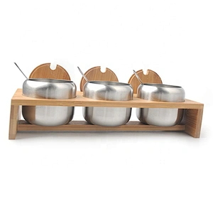 Hot selling bamboo spice rack with stainless steel jars for kitchen