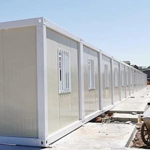 Casa prefabricada del envase de los materiales del juego completo de GZXINCHENG con la puerta y la ventana
