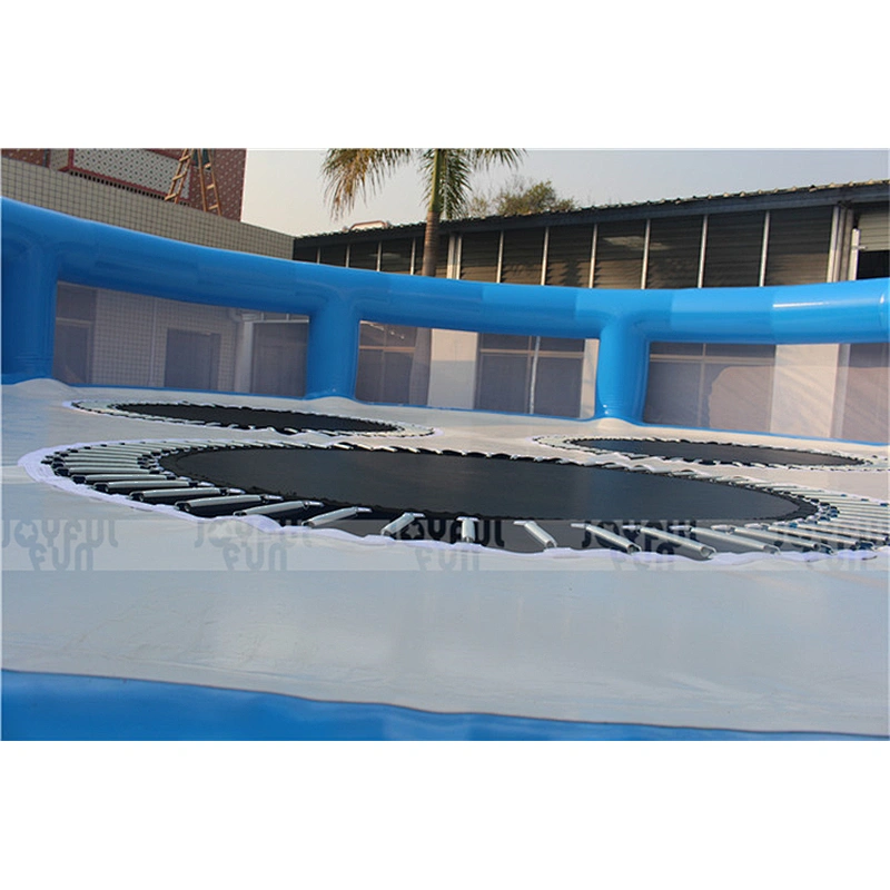 Large outdoor light blue inflatable trampoline park