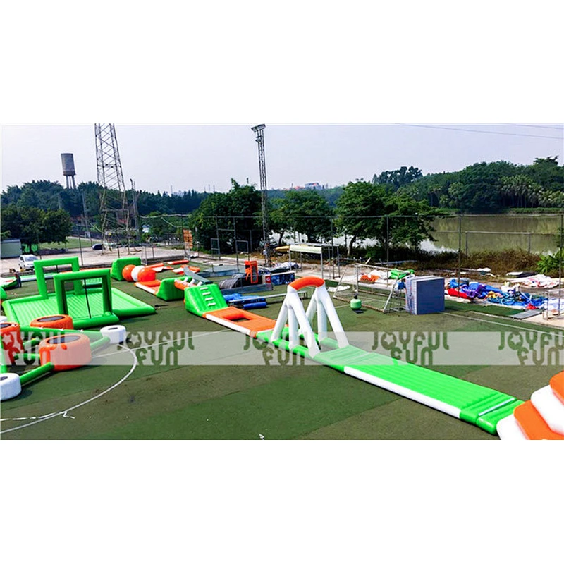 Customizable green and orange inflatable floating water park