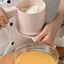 Handheld flour sieve cup