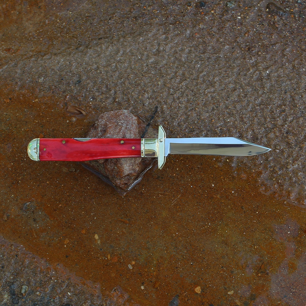 bone handle edc knife featuring a textured natural grip for wet conditions