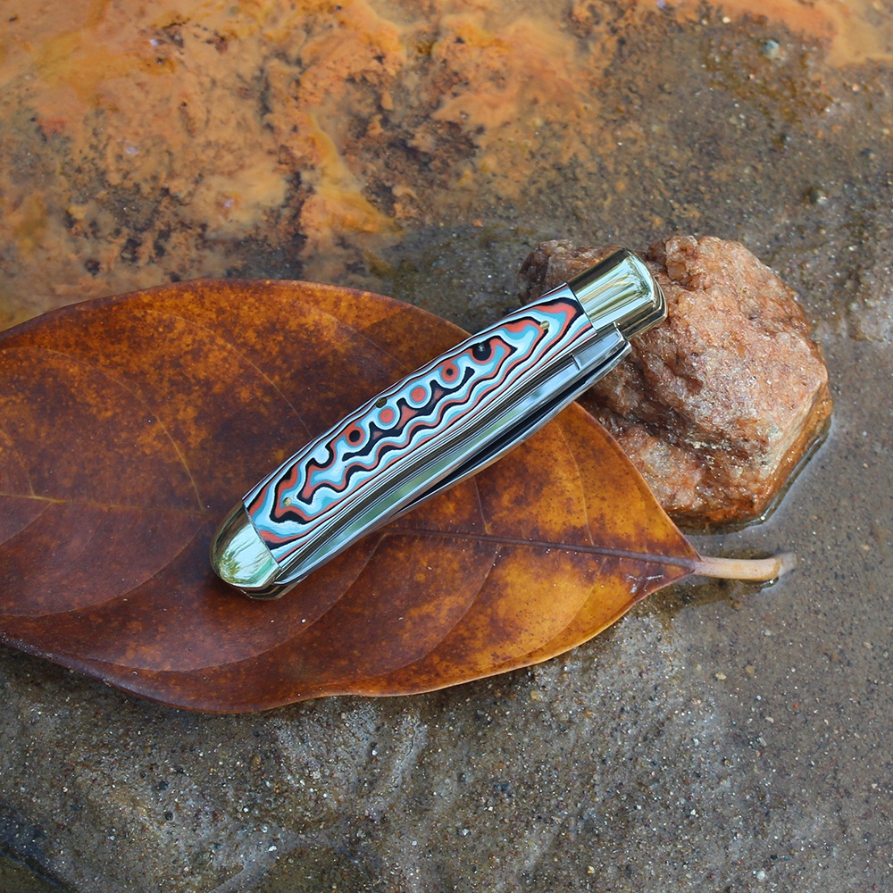 micarta handle folding knife outdoor scene