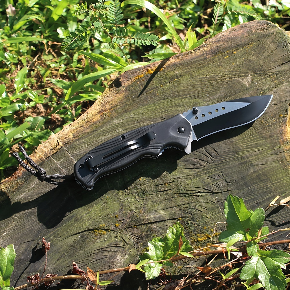 tactical survival knife with ergonomic handle for outdoor emergencies