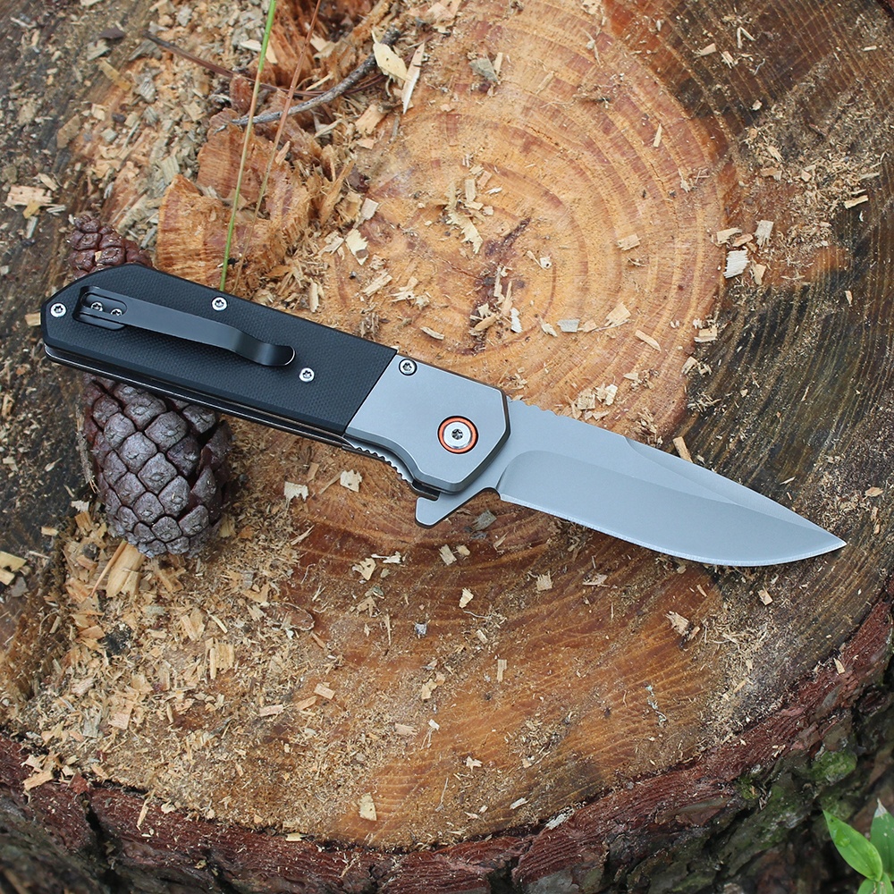 Self defense assisted opening pocket knife