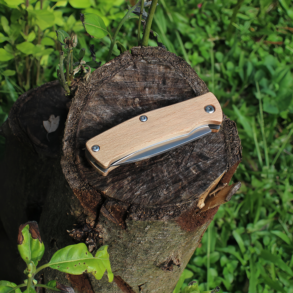 wood handle folding knife close-up viewed