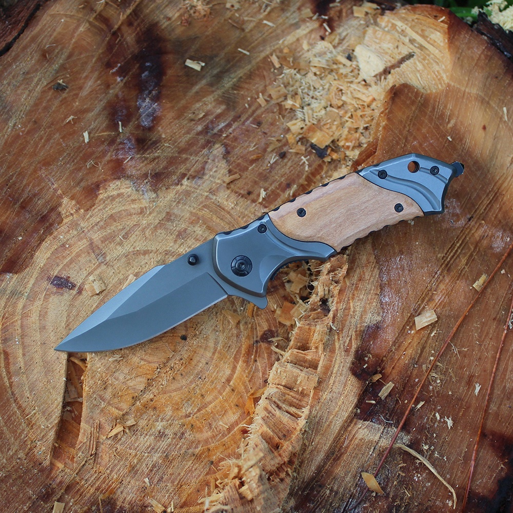 custom pocket knife with grey titanium blade