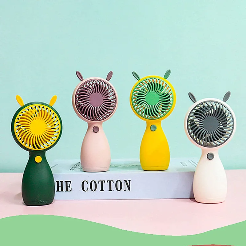 2022 Cute Mini Low Noise Mute USB Rechargeable Handheld Hand Eyelash Air Cooling Cordless Portable Fan