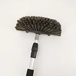 telescopic flow through brush