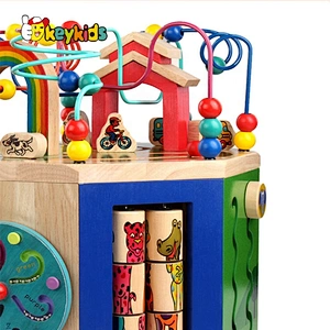 My busy town toddlers wooden activity cube with music W11B226