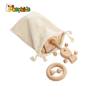 High quality grasping organic wooden rattle with bells W07I172
