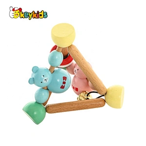 High quality grasping organic wooden rattle with bells W07I172