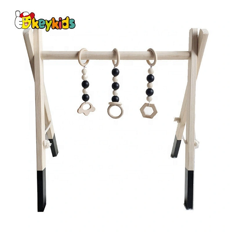 wholesale natural wooden baby activity gym with hanging toys W08K175