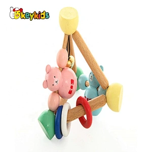 High quality grasping organic wooden rattle with bells W07I172