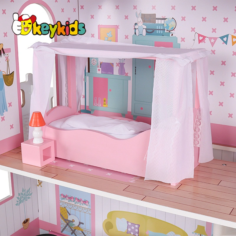 Factory stock girls pink wooden dollhouse with accessories W06A379