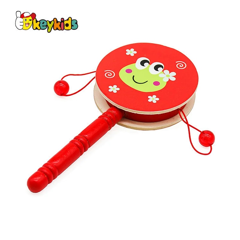 Hand-painted cartoon double-sided wooden drum-shaped rattle for children W07G018