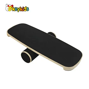Wholesale cheap wooden rocker balance board with PE roller W01F076