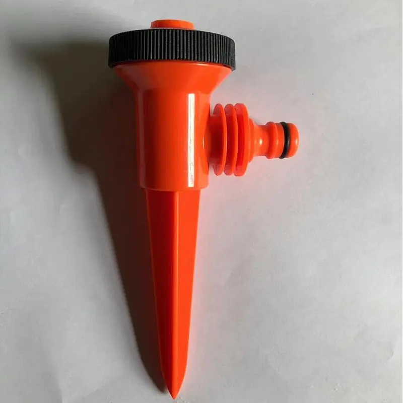 red plastic spike sprinkler