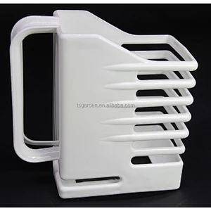 white plastic sauce bottle holder