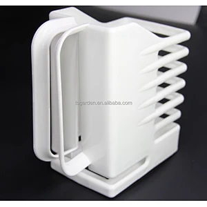 white plastic sauce bottle holder