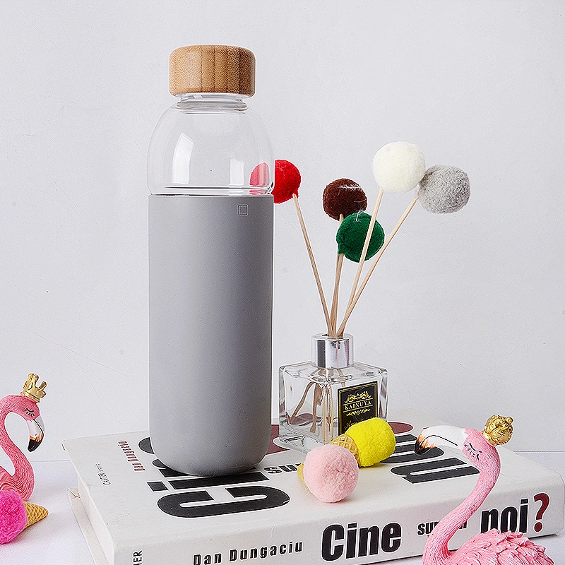 new design borosilicate bpa free 500 ml silicone glass bottle bamboo lid bottle