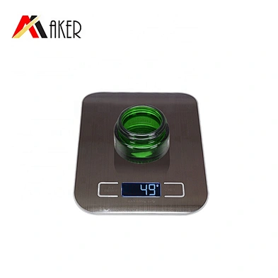 Fashion design 20ml semi-transparent green empty cosmetic cream glass jar with luxury gold color screw cap