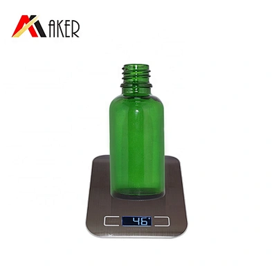 Factory wholesale Low MOQ 30ml empty round green cosmetic essential oil glass dropper bottle