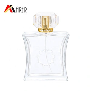 Luxury empty 100ml special shape clear crystal perfume glass bottle with gold aluminum sprayer acrylic cap