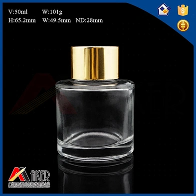 50ml clear glass aroma diffuser bottle with gold aluminum covered screw cap and plastic plug