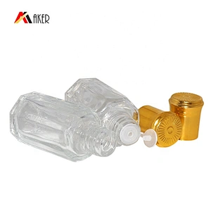 Wholesale factory clear 10ml octagonal essential oil glass bottle with gold aluminum covered screw cap