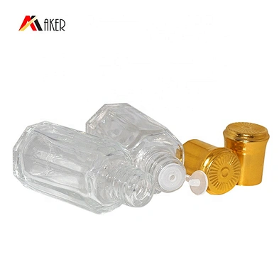 Wholesale factory clear 10ml octagonal essential oil glass bottle with gold aluminum covered screw cap