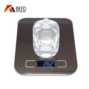 China manufacturer 100ml clear perfume glass bottle with gold aluminum sprayer acrylic cap