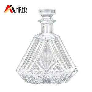 Custom new 600ml clear empty XO brandy glass wine bottle packaging with round glass top rubber stopper