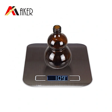 Wholesale cucurbit special 100ml amber cosmetic essential oil glass bottle with gold aluminum cap