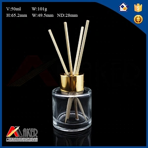 50ml clear glass aroma diffuser bottle with gold aluminum covered screw cap and plastic plug