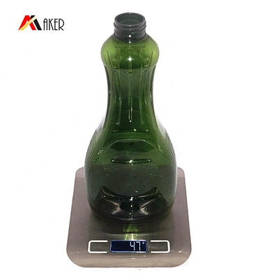 New wholesale 700ml green unique shape beverage bottle empty plastic pet juice bottle with screw cap
