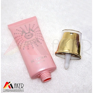 Supply 30ml super oval LDPE plastic cosmetic cream tube with gold aluminum covered airless pump