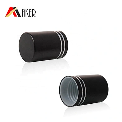 Glass roller ball and black aluminum covered 16mm screw cap with silver rims