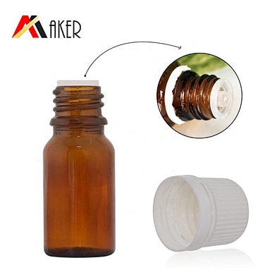 White plastic ribbed tamper proof screw cap and plastic orifice reducer for glass essential oil bottle