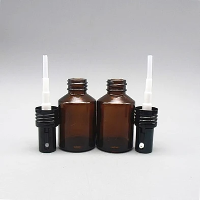 Slant shoulder round empty 60ml 100ml glass mist sprayer serum bottle with all metal pump