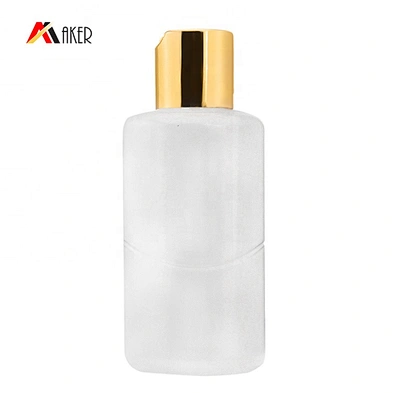 Wholesale 100ml PE plastic cosmetic sunscreen lotion bottle with gold aluminum covered disc cap