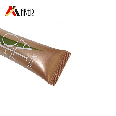 New design 25g LDPE plastic cosmetic eye cream massage applicator tube packaging with electroplated gold screw cap
